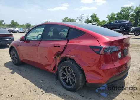 2024 Tesla Model Y from USA, damaged, VIN 7SAYGDED6RF211660